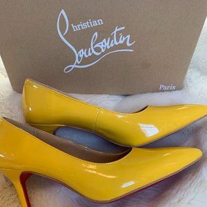 Christian Louboutin Yellow Pumps
